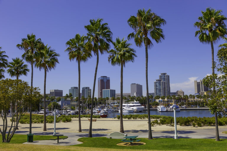 Rainbow Harbor with city skyline at Long Beach , CA